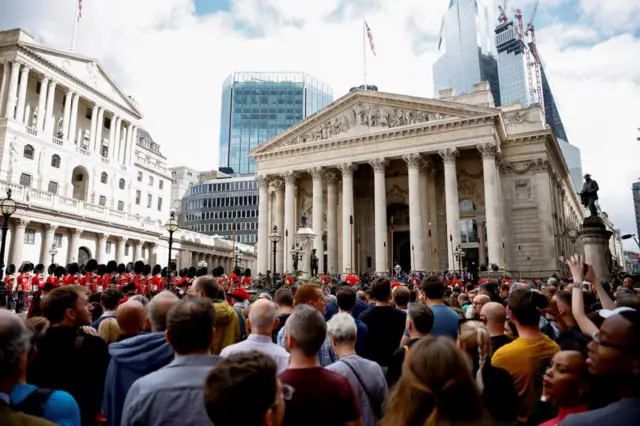 People attend the City Proclamation ceremony of Britain's King Charles, following the passing of Britain's Queen Elizabeth, at the Royal Exchange in the City of London