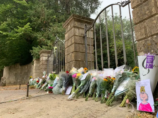 Flowers left at the gates of Highgrove House