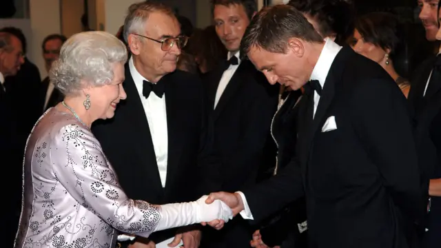 Daniel Craig pictured with Queen Elizabeth II