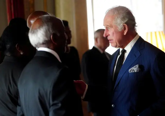 Britain's King Charles attends a reception with Realm High Commissioners