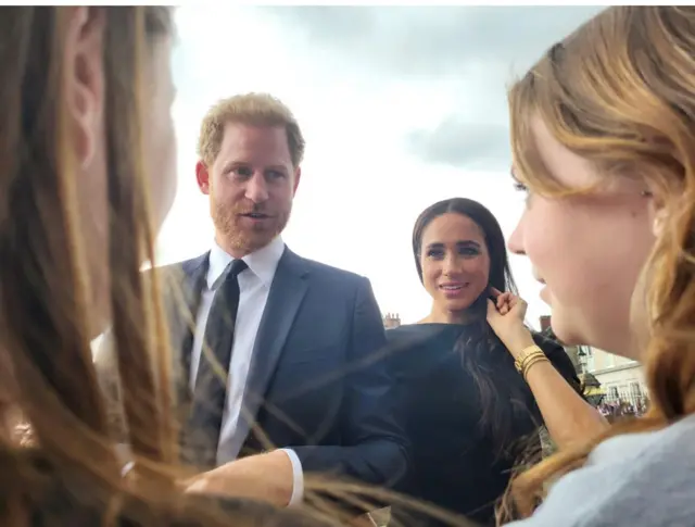 Harry and Meghan talking to Eleanor and Lexie at Windsor