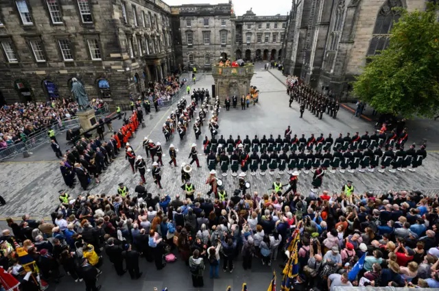 Crowds watch an Accession Proclamation Ceremony at Mercat Cross, publicly proclaiming King Charles III as the new monarch on September 11, 2022 in Edinburgh, Scotland.