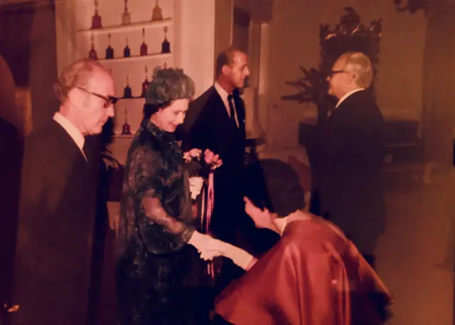 The Queen and Prince Philip being greeted by members of the British consulate in Morocco