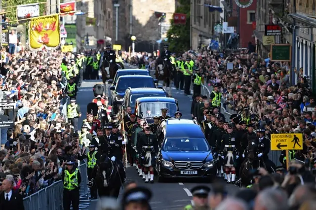 The procession winds its way up the Royal Mile in Edinburgh