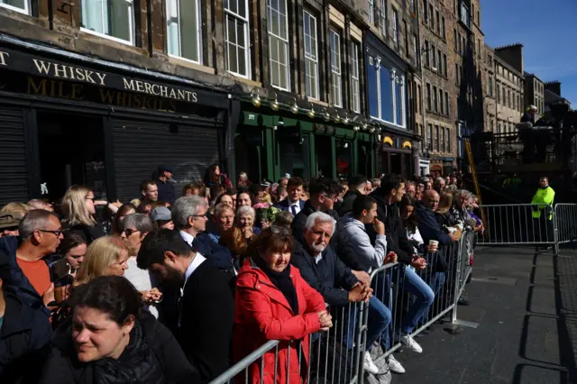 People gather outside St Giles' Cathedral, following the death of Britain's Queen Elizabeth