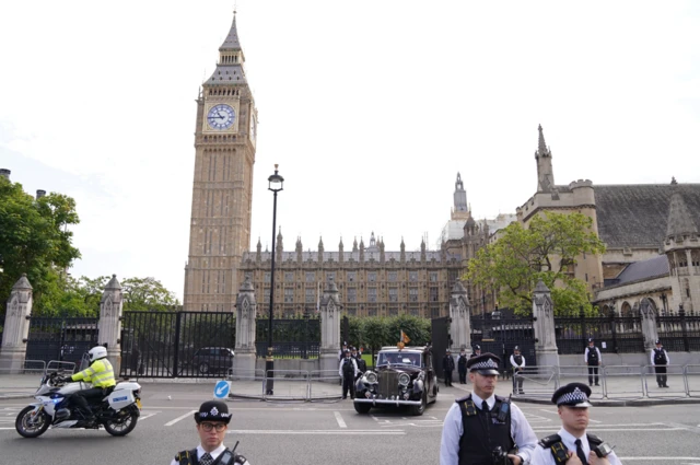 Palace of Westminster with King Charles leaving in Royal car