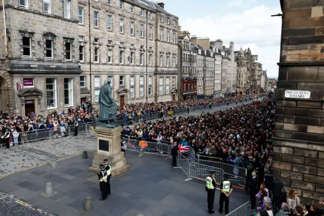 Crowds gather near Mercat Cross