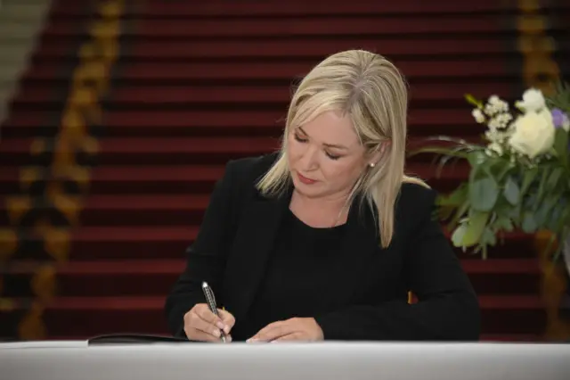 MIchelle Oneill signs condolence book