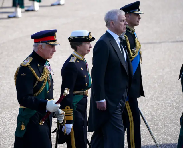 King Charles III, the Princess Royal, the Duke of York and the Earl of Wessex walk behind Queen Elizabeth II's coffin