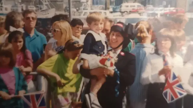 Rhys and his mum Glenna Hughes waiting to see the Queen