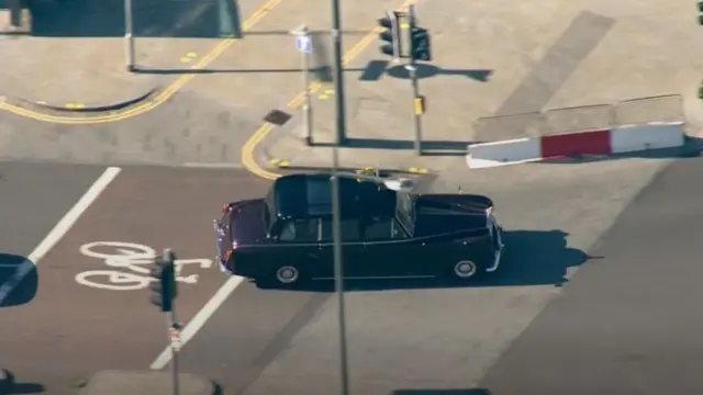 The car carrying King Charles and Camilla makes its way to Edinburgh airport