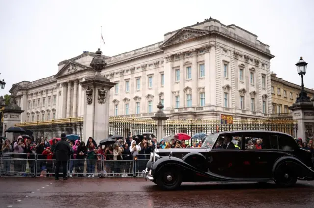 The King's car arrives at Buckingham Palace