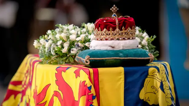 The Scottish crown rests on top of the coffin of Queen Elizabeth II at St Giles' Cathedral, Edinburgh