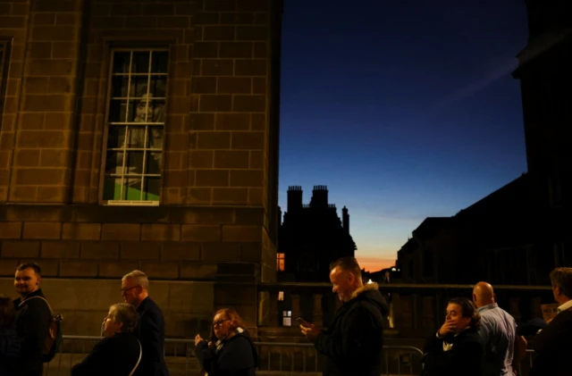 The sun rose in Edinburgh as people waited in line to ay their respects to Queen Elizabeth II at St Giles' Cathedral