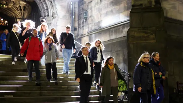 Mourners emerge after viewing the Queen's coffin