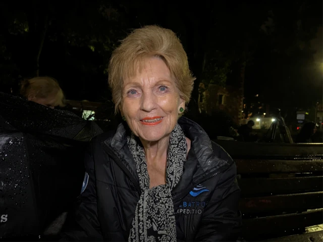 A woman in line to see the Queen's coffin