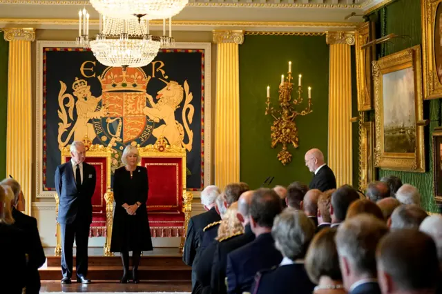 King Charles III and the Queen Consort, listening to a Message of Condolence by Alex Maskey, the speaker of the Northern Ireland Assembly