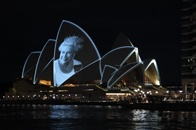 An image of the Queen is projected on to the Sydney Opera House