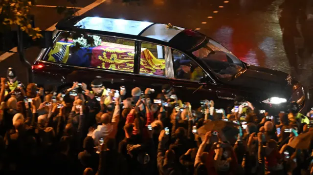 The hearse carrying the coffin of Queen Elizabeth II passes Wellington Arch