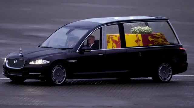 The Queen's hearse leaving RAF Northolt