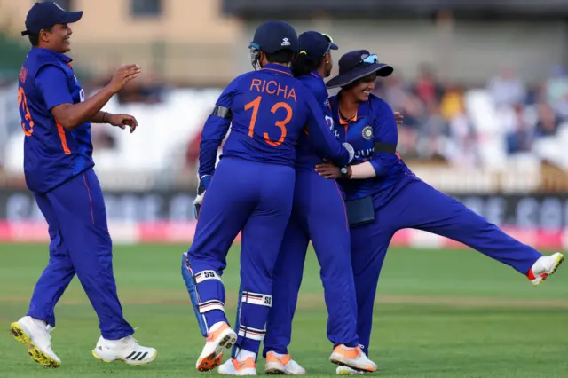 India celebrate a wicket