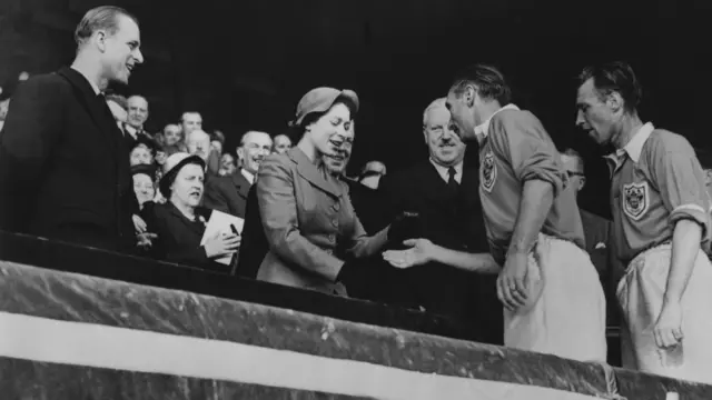 Stanley Matthews receives his medal from Queen Elizabeth II in 1953