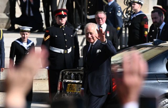 King Charles III greets crowds as he arrives at St Anne's Cathedral in Belfast