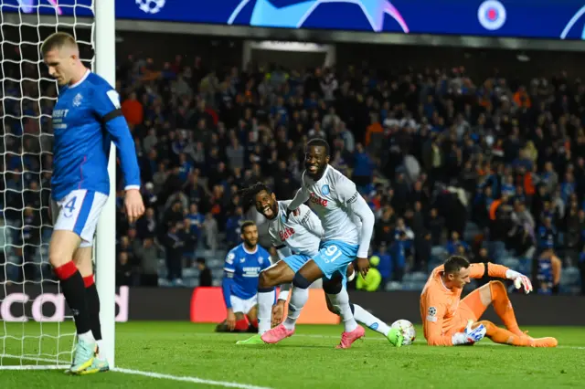 Tanguy Ndombele wheels away after adding a third in stoppage time