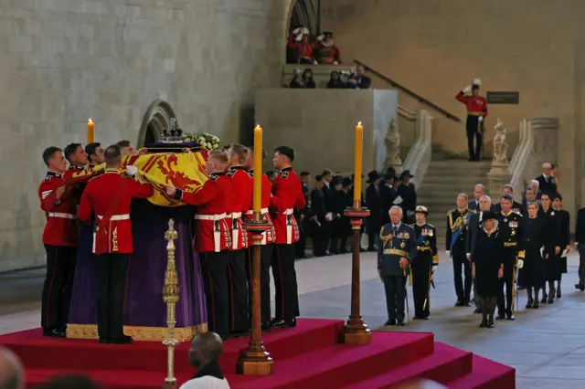 A general view as King Charles III, Princess Anne, Princess Royal and Camilla, Queen Consort view the coffin carrying Queen Elizabeth II being laid to rest in Westminster Hall for the Lying-in State on September 14, 2022