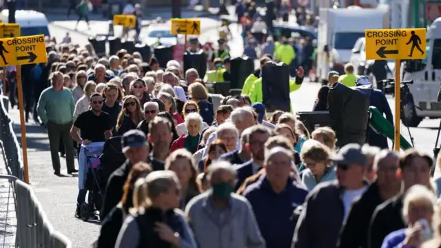 A long queue of members of the public in Edinburgh on Tuesday