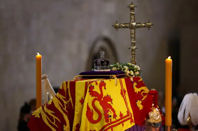 The Crown rests on top of the Queen's coffin in Westminster Hall