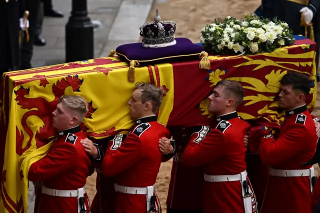 Pall bearers carrying Queen's coffin