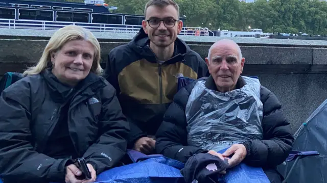 Kristian with neighbours Mandy Desmond and her 85-year-old dad Michael Darvill