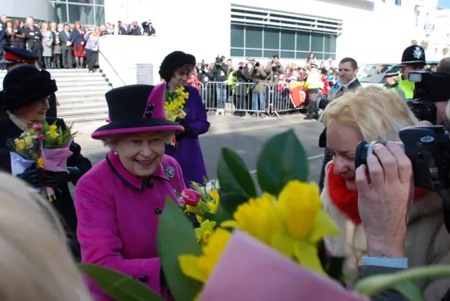 The Queen accepting flowers in Leamington Spa