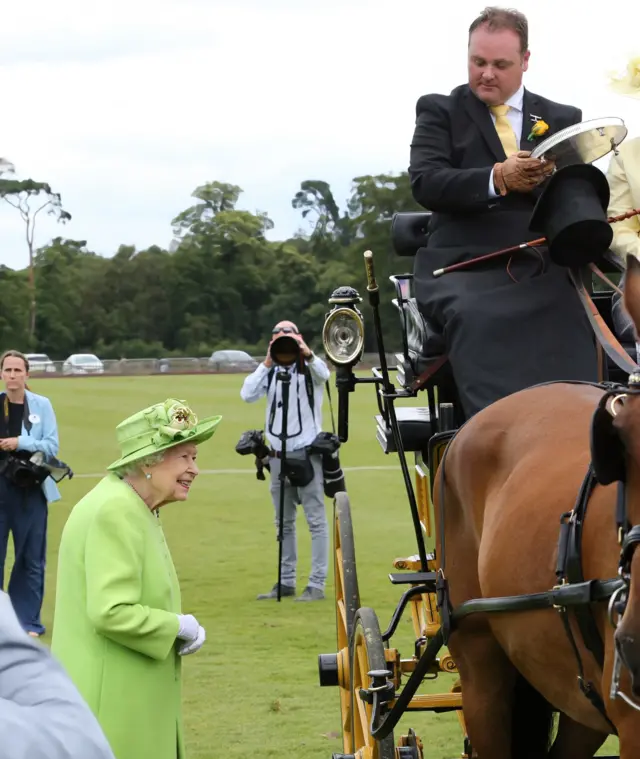 The Queen with carriage driver Michael Malone