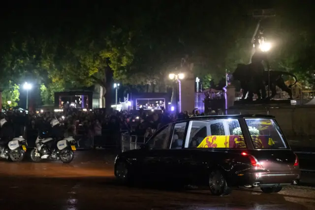 The Queen's coffin was driven to Buckingham Palace as crowds gathered in the streets nearby to watch