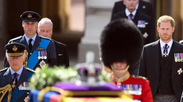 The King and the Princes walk behind the Queen's coffin