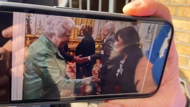 Hazel's picture of her meeting the Queen as seen on her phone