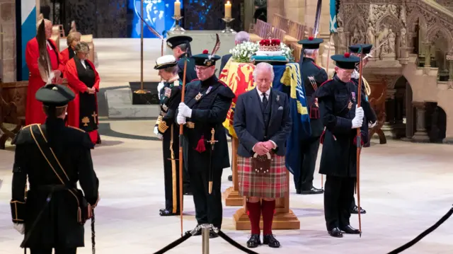 King Charles III and his siblings stand around the Queen's coffin at St Giles' Cathedral, Edinburgh