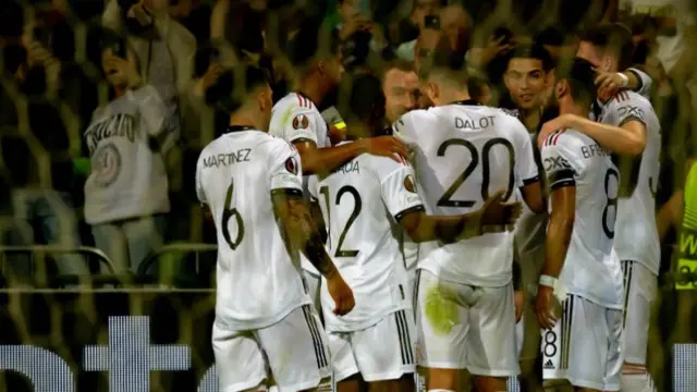 Manchester United players celebrate