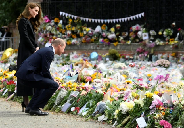 The Prince of Wales and princess of wales spent time looking at floral tributes outside Sandringham