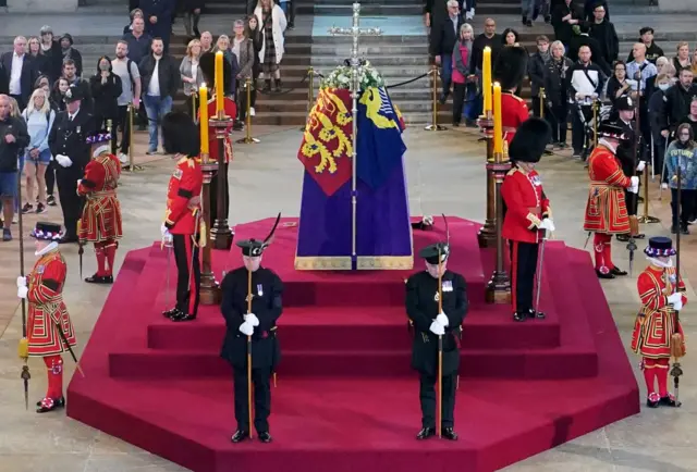 Alistair Jack and Ben Wallace standing guard over the Queen's coffin in Westminster Hall