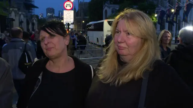 Two women speaking to a BBC reporter outside Westminster