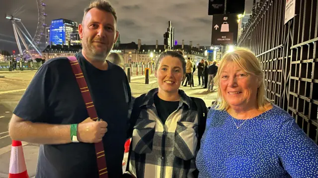 Members of the public Annette Neary (right) and her children Ian and Joanne near the London Eye