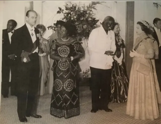 The Queen and Prince Phillip speaking to Zambia's former president