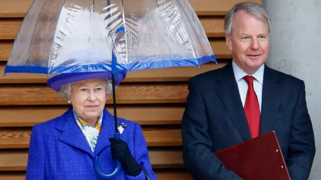 The Queen, accompanied by her then private secretary Robin Janvrin, shelters under an umbrella as she visits the new National Tennis Centre in Roehampton, London, on 29 March 2007