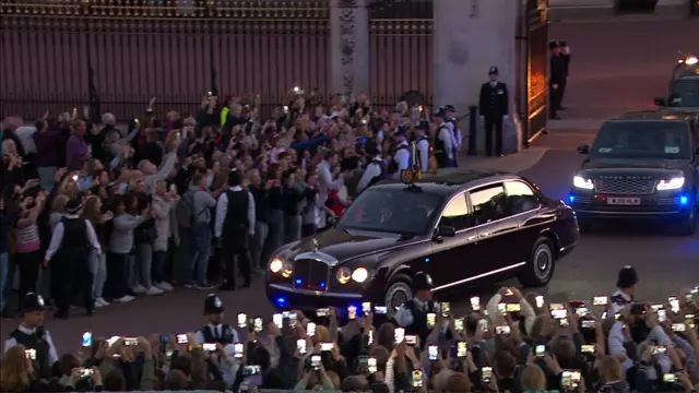 Car driving out of Buckingham Palace