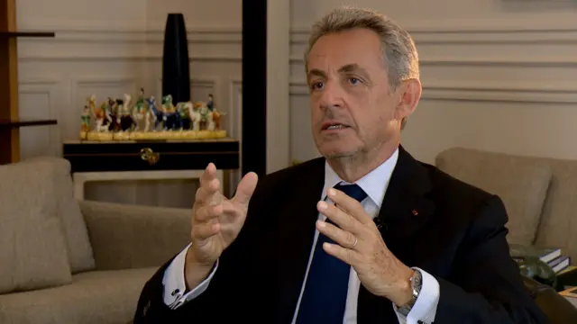 Former French President Nicolas Sarkozy speaks to the BBC's Hugh Schofield in Paris