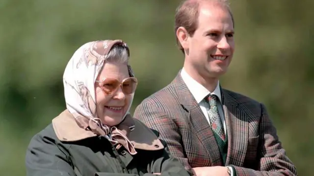 File photo dated 14/5/1995 of Queen Elizabeth II and her youngest son, Prince Edward, watching the carriage driving championships during a visit to the Royal Windsor Horse Show