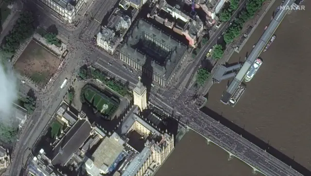 Satellite images show the thousands of people waiting to get into Westminster Hall